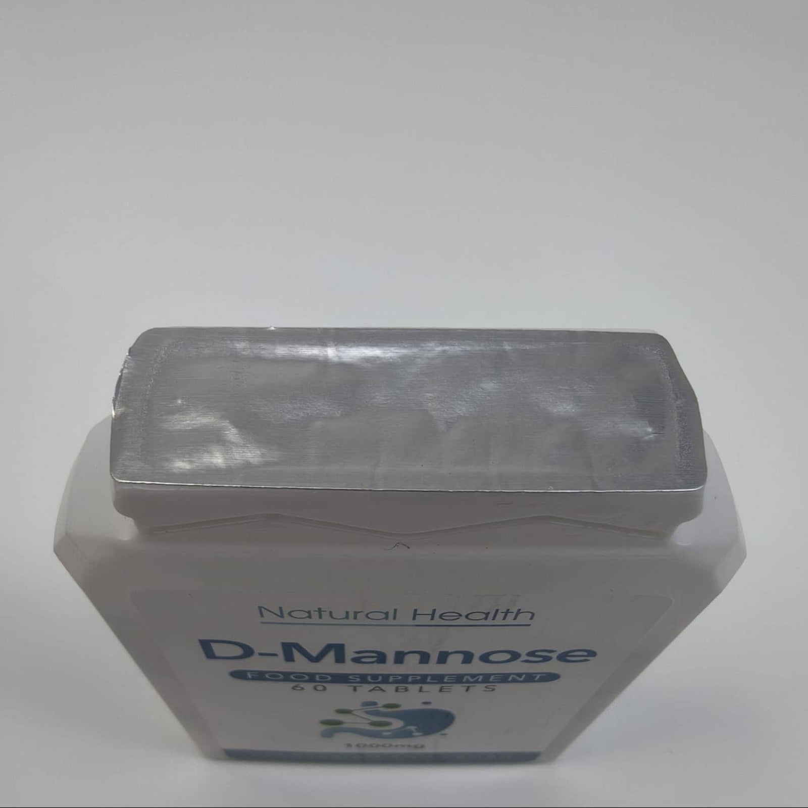 Container of D-Mannose supplement for - picture of interior foil seal
