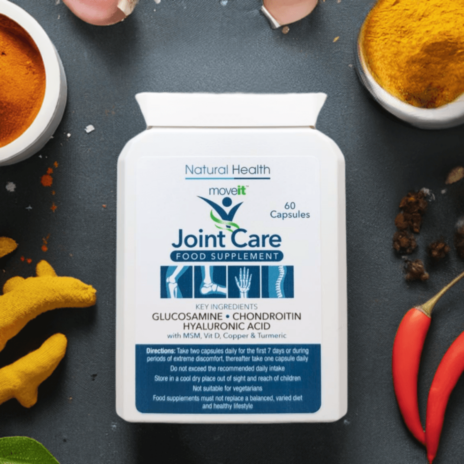 Joint care supplement bottle with turmeric, chili peppers, and other ingredients on a dark surface