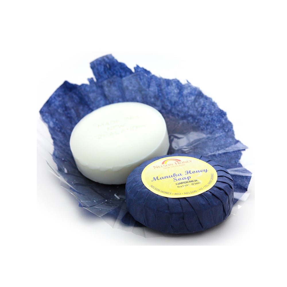 Nelson Honey natural gardeners soap with manuka honey round white soap and blue wrapped soap bar on tissue