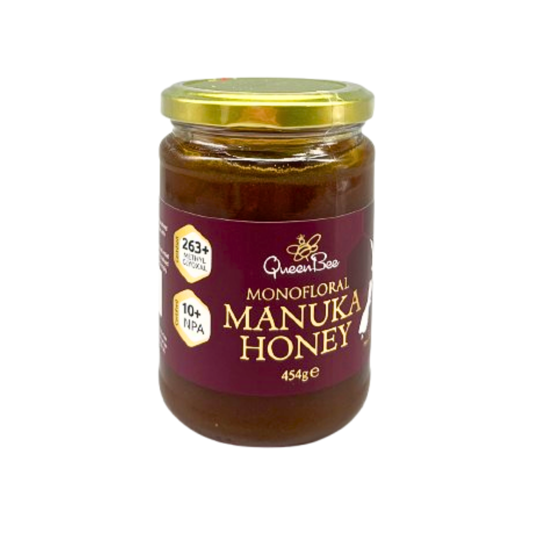 Queen bee manuka honey 454g glass jar with gold lid and purple label showing monofloral honey content