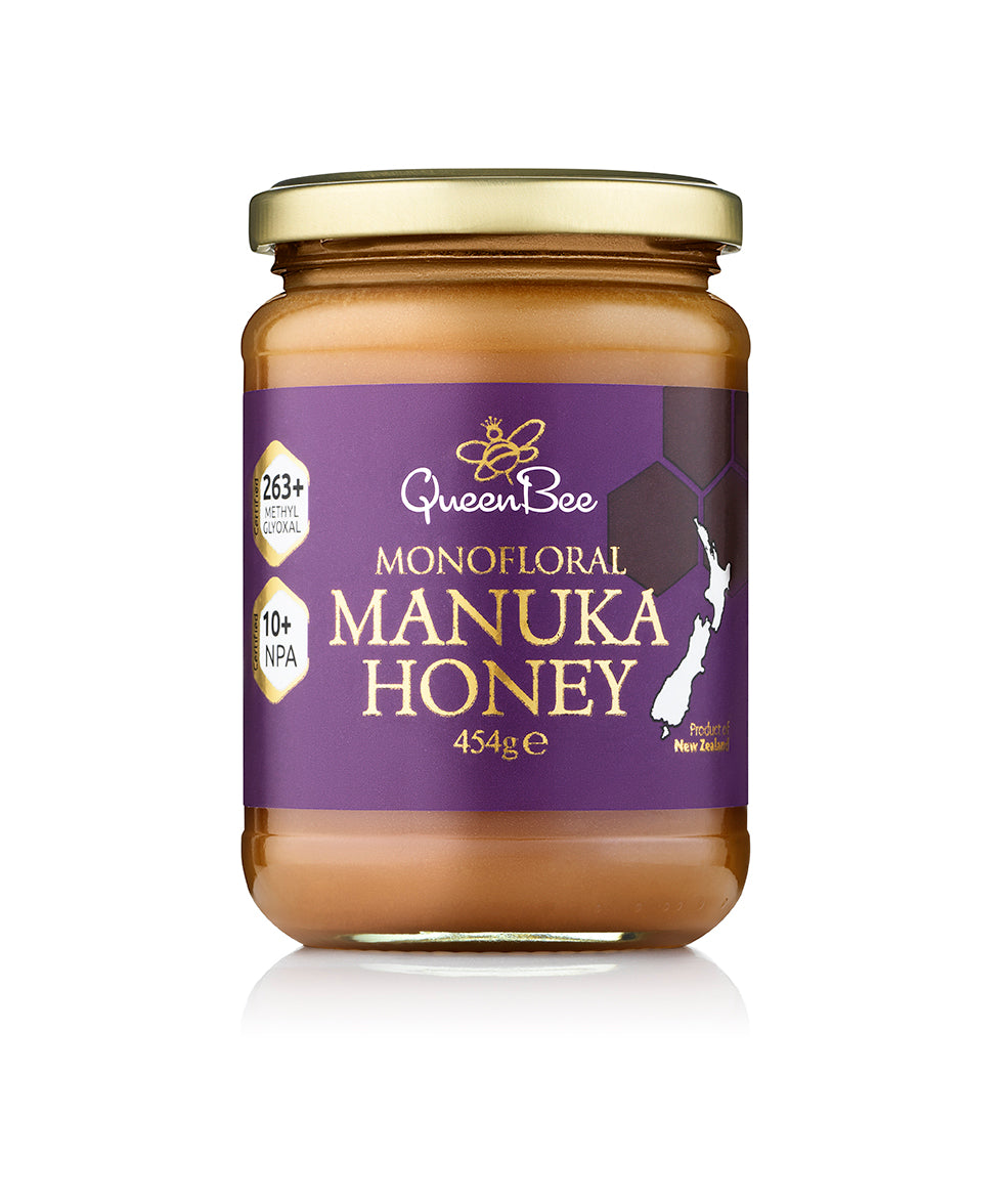 Queen Bee Manuka Honey 454g glass jar with purple label and gold lid showing natural monofloral honey