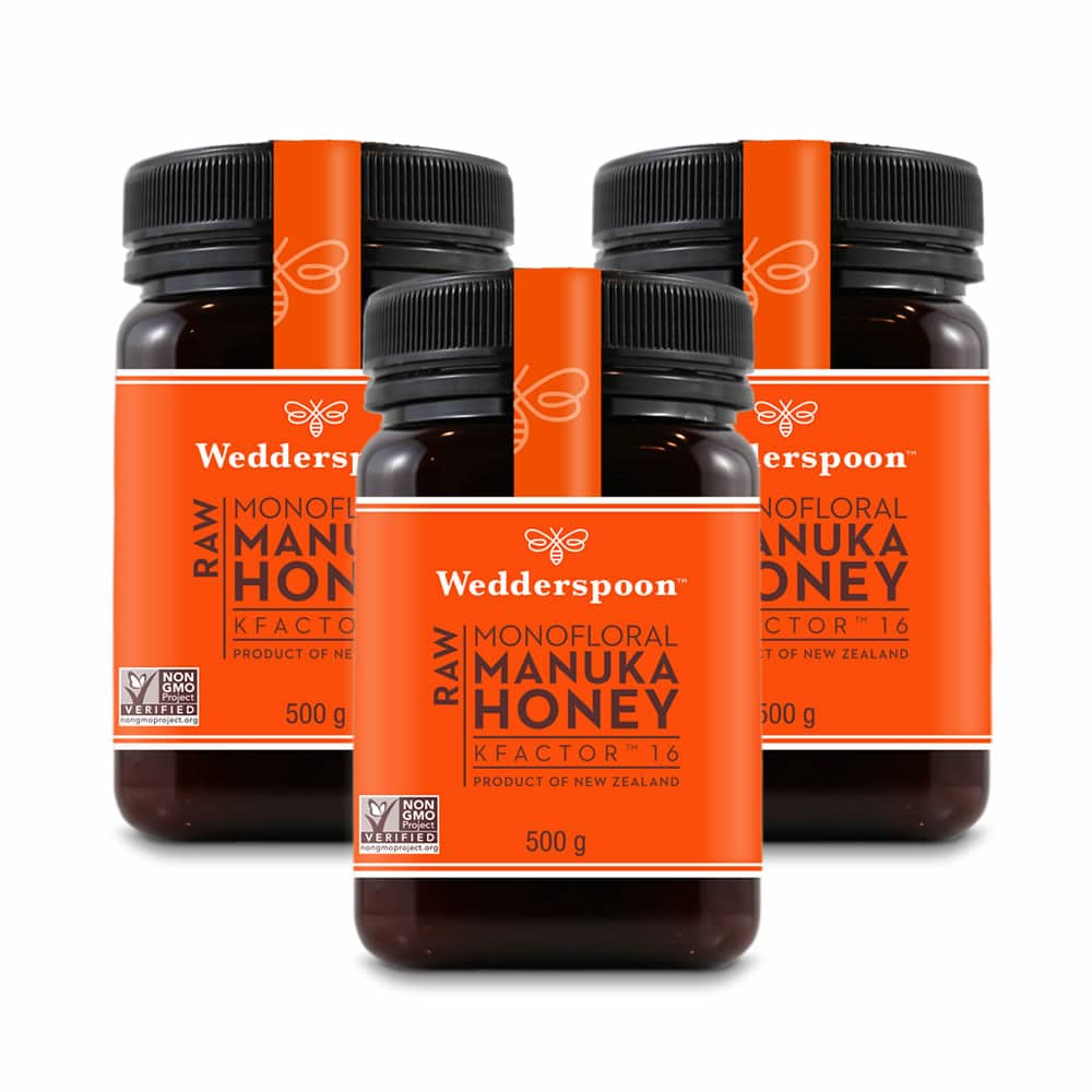Three jars of Wedderspoon raw Manuka honey KFactor 16, each 500 grams in size