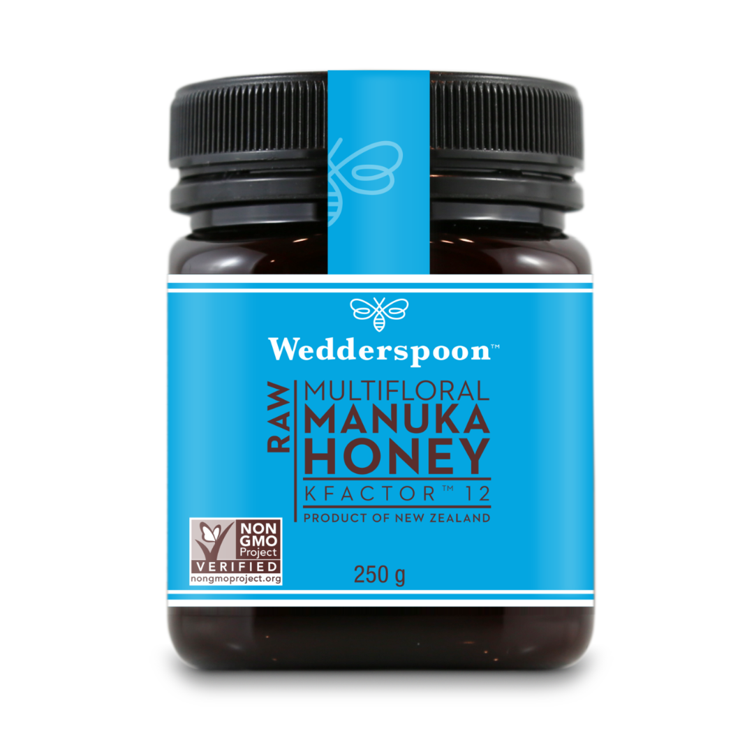 Wedderspoon raw manuka honey 250g kfactor 12 in a dark jar with blue label and black lid