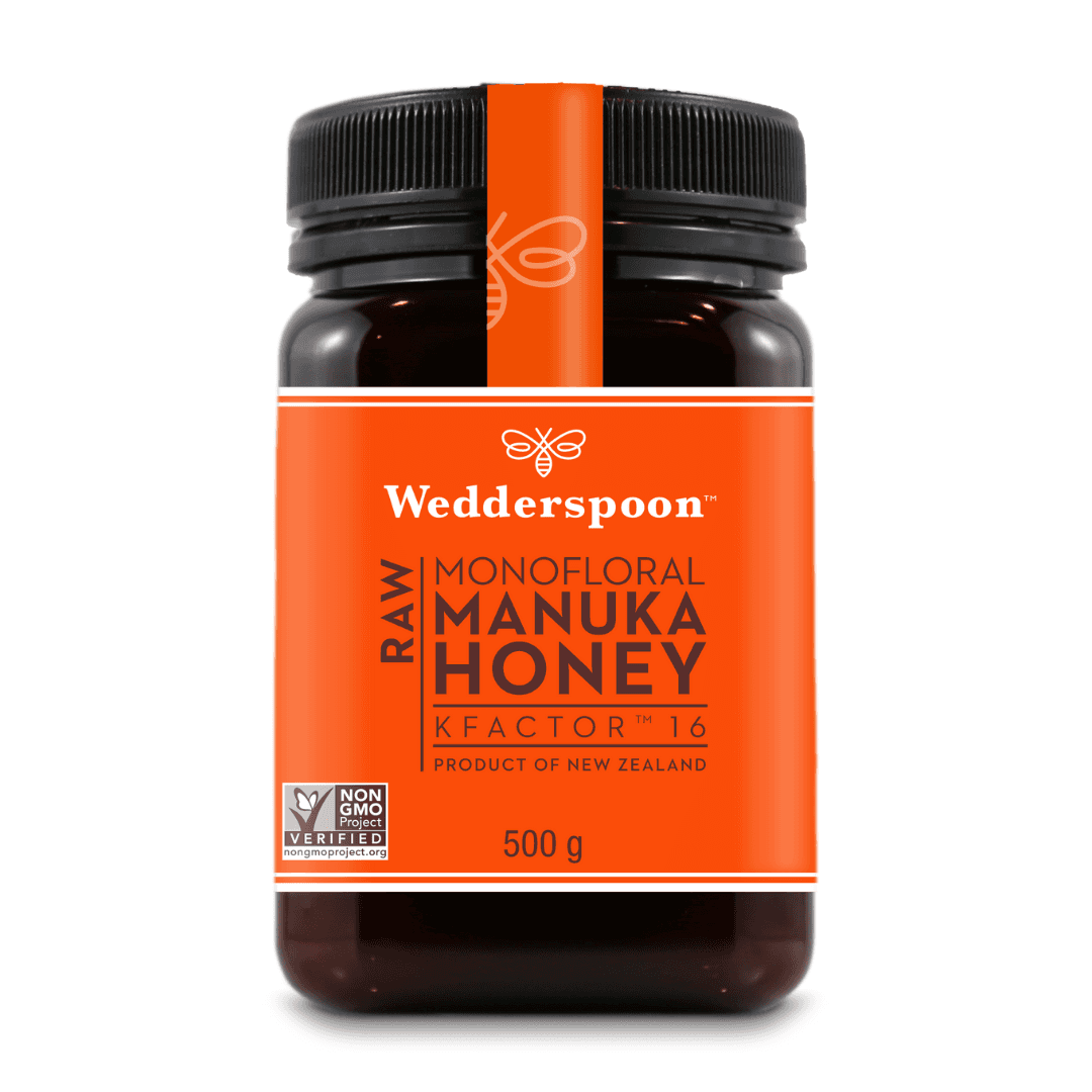 Wedderspoon raw Manuka honey KFactor 16 in a 500g jar with an orange label