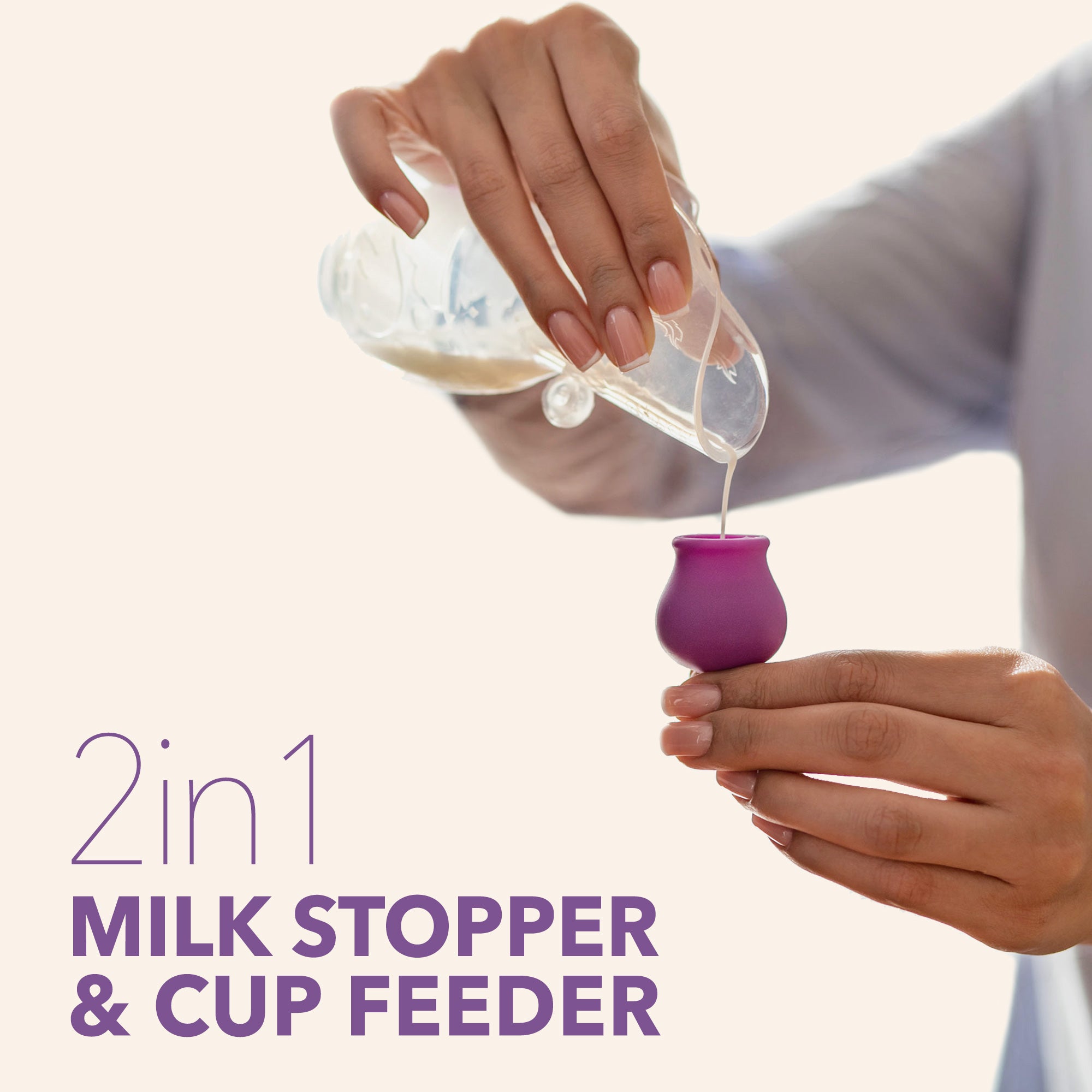 Person pouring milk into a purple 2 in 1 milk stopper and cup feeder with Mochi manual breast pump branding