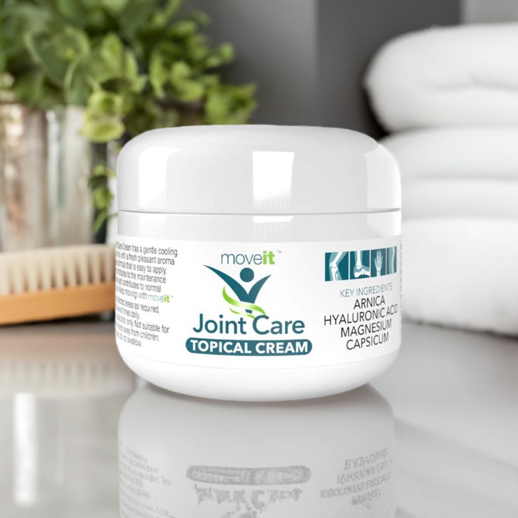 Natural Health World UK joint care cream for pain relief jar on bathroom counter with towel and plant
