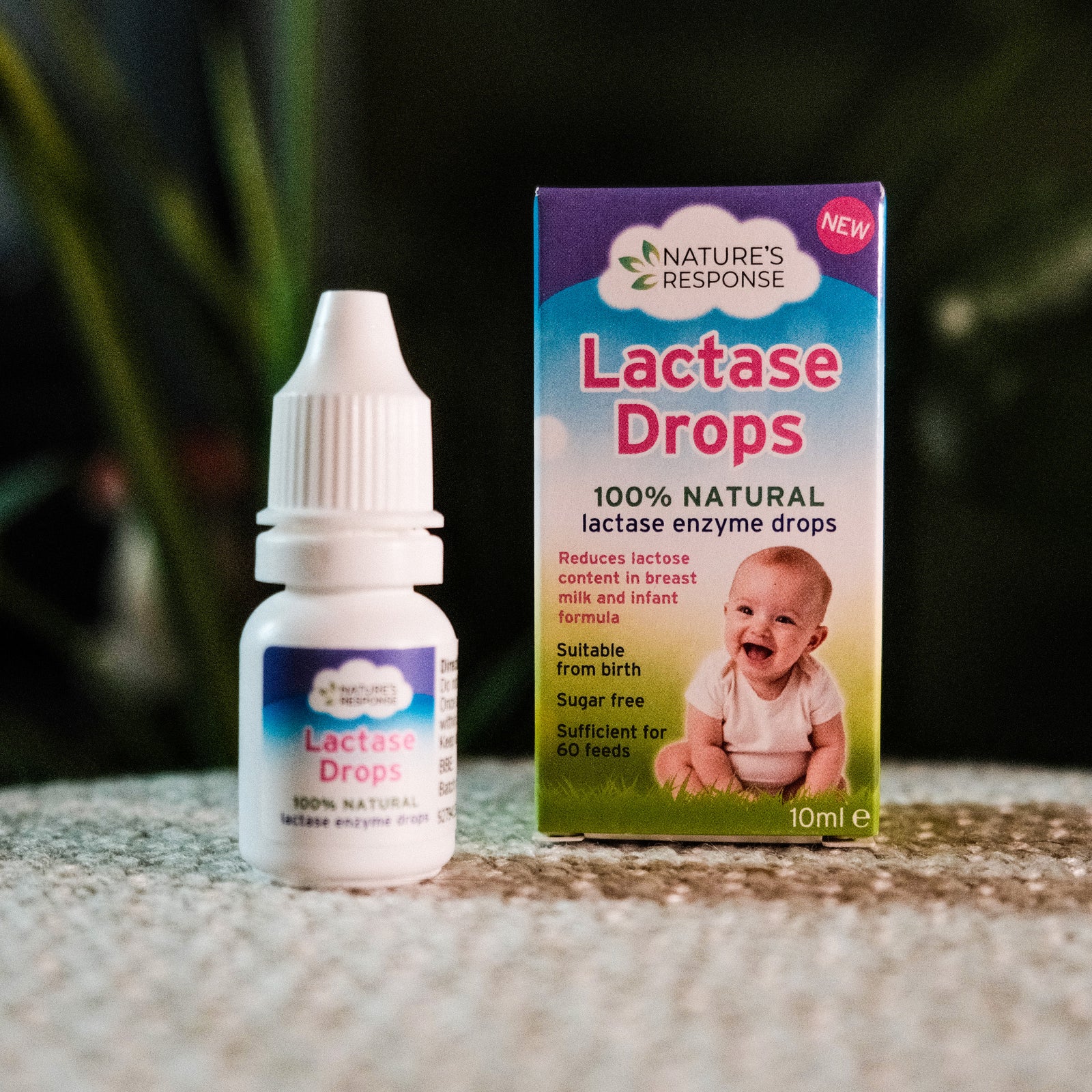 Natures Response natural lactase drops for babies 10ml bottle and box with smiling baby