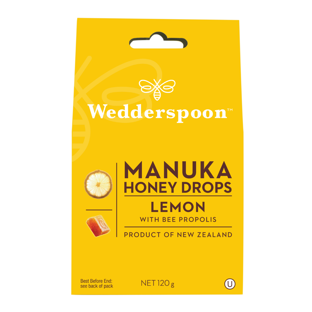 Wedderspoon Manuka honey drops lemon throat lozenges yellow pack with bee logo and 120 g net