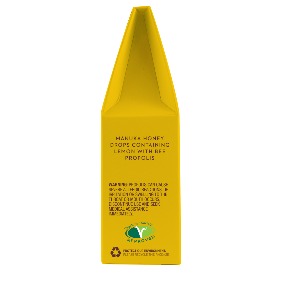 Wedderspoon yellow carton of throat lozenges labelled Manuka honey drops lemon with bee propolis text