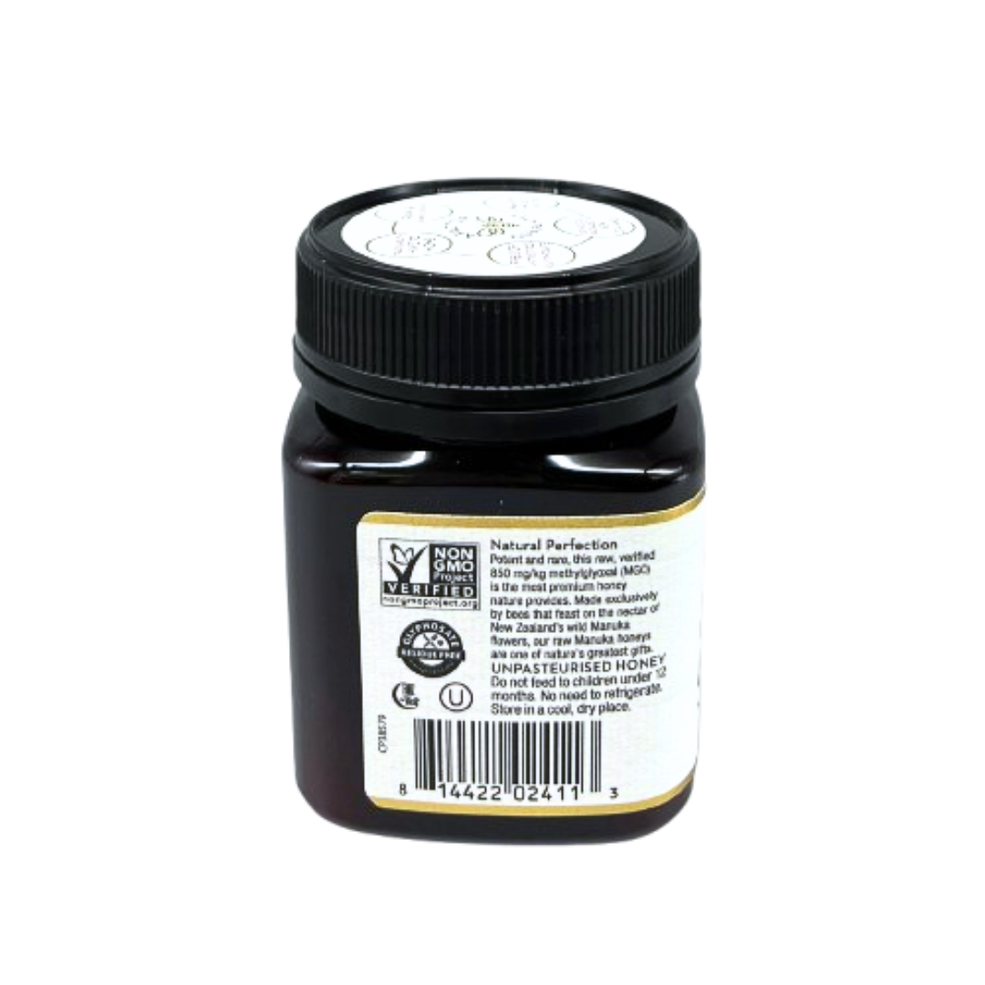 Wedderspoon jar of raw manuka honey 850 mgo in dark plastic jar with black lid and product label