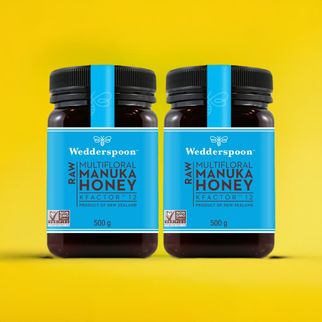 Two jars of Wedderspoon KFactor 12 honey multifloral Manuka honey 500g each with blue labels
