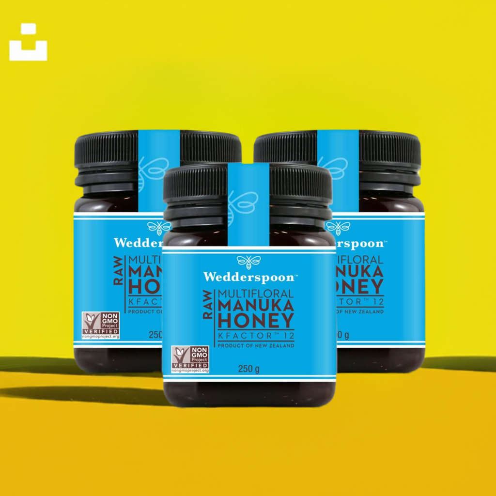 Wedderspoon Raw Manuka Honey KFactor 12 250g Triple pack with blue label jars on yellow background