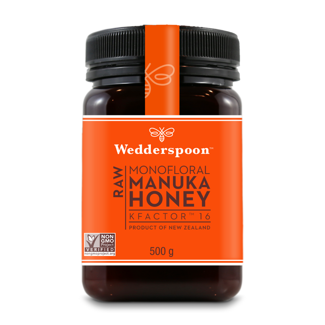 Wedderspoon raw Manuka honey KFactor 16 in 500g jar with orange label and black lid